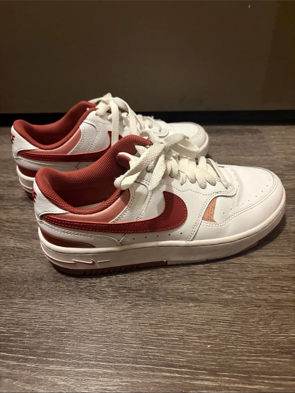 Women’s Nike White Sneakers with Red Swoosh